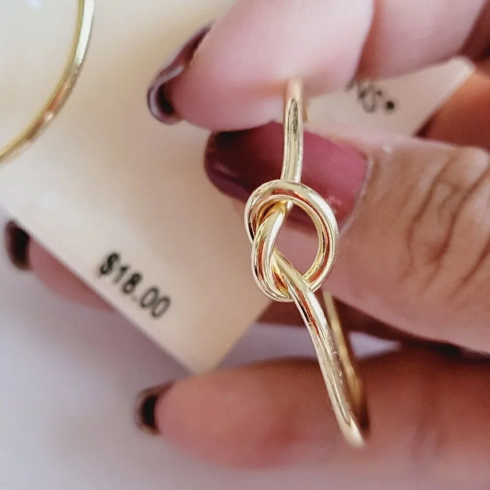 New Directions Gold Tone Knot Hoop Earrings 1.5